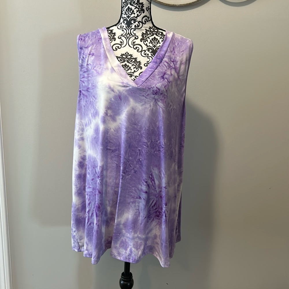 NWOT.  Woman’s v-neck tank with purple and white tie dye pattern.  Size 3XL.